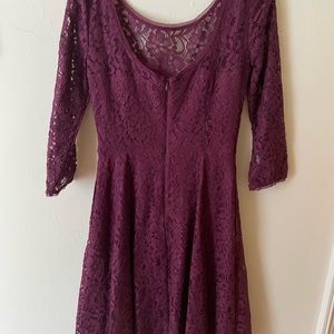Beautiful maroon lacy dress lined  with accented waist to flatter your figure